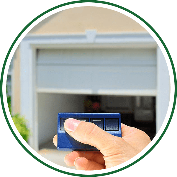 Image of a person using a garage door opener