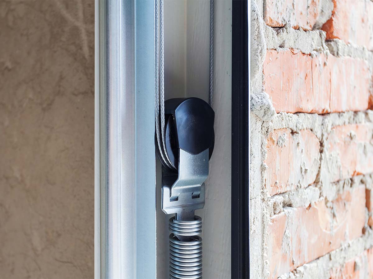 Garage doors installation. Close up of lifting system