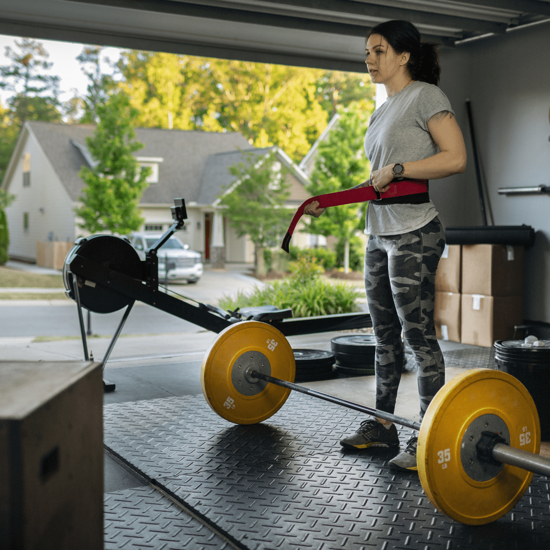 Woman working out in garage