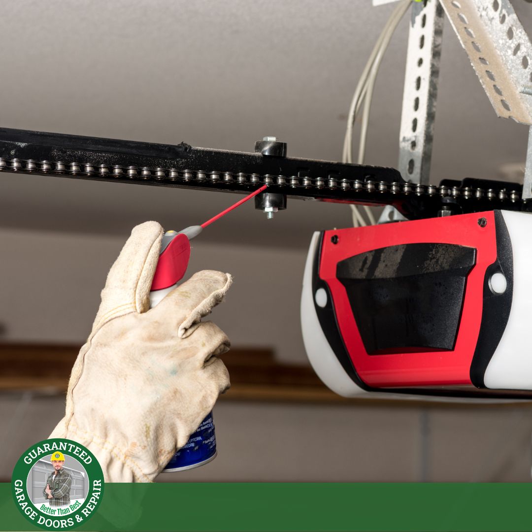 garage door track being lubricated